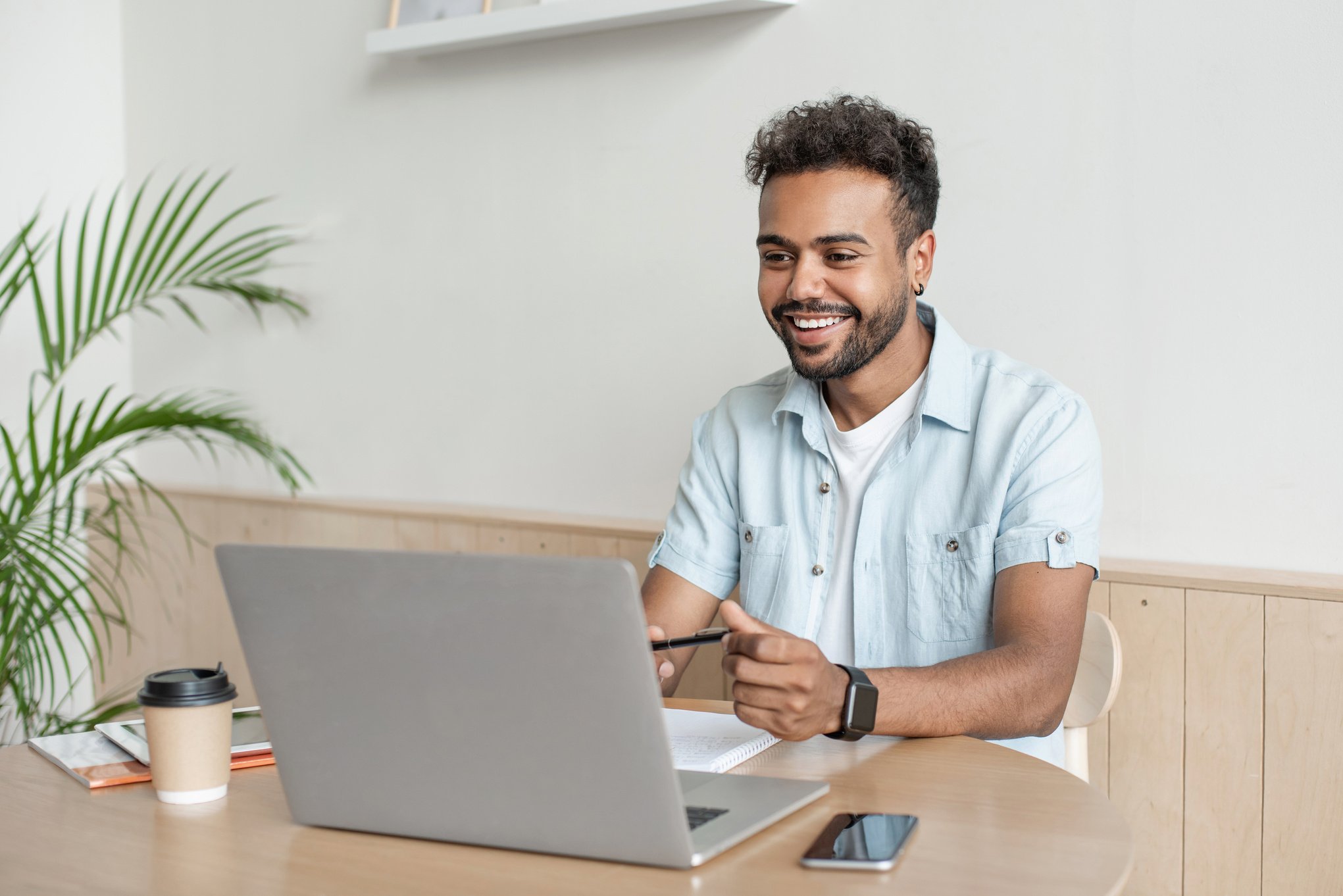 Young man having meeting online